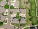 Aerial view of well-maintained neighborhood and lush green golf course at 12912 Grant Cir # A, Thornton, CO 80241