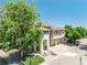Beautiful two-story home featuring a covered porch, attached garage, and landscaped front yard at 12912 Grant Cir # A, Thornton, CO 80241