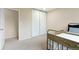 Bedroom with a view to other rooms and featuring a large closet and a bed at 4212 W Pondview Dr, Littleton, CO 80123