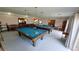 Game room with pool tables and comfortable seating provides a fun and relaxed atmosphere at 4212 W Pondview Dr, Littleton, CO 80123