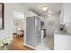 Updated kitchen featuring stainless steel appliances and tile flooring at 4212 W Pondview Dr, Littleton, CO 80123