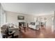 Inviting living room with hardwood floors and a comfortable seating area at 4212 W Pondview Dr, Littleton, CO 80123