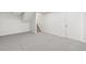 Finished basement with neutral carpet and stairs leading to the main floor at 2777 S Sedalia St, Aurora, CO 80013