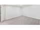 Spacious basement with neutral carpet and white walls at 2777 S Sedalia St, Aurora, CO 80013