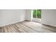 Bright bedroom features a large window and hardwood floors at 2777 S Sedalia St, Aurora, CO 80013