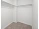 Walk-in closet features carpeted floors and ample storage space for clothes at 2777 S Sedalia St, Aurora, CO 80013