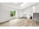 Bright living room with hardwood floors, natural light, and a fireplace at 2777 S Sedalia St, Aurora, CO 80013