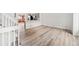 Open-concept living space with hardwood floors, bright and airy at 2777 S Sedalia St, Aurora, CO 80013