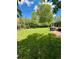 Expansive backyard with lush lawn and patio, offering ample space for recreation and relaxation at 4425 E Harvard Ave, Denver, CO 80222