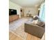 Inviting living room with comfortable seating, stylish decor, and lots of natural light at 4425 E Harvard Ave, Denver, CO 80222