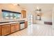 Eat-in kitchen featuring stainless steel appliances and tiled floors at 20229 E Red Fox Ln, Centennial, CO 80015