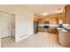 Eat-in kitchen featuring stainless steel appliances and tiled floors at 20229 E Red Fox Ln, Centennial, CO 80015