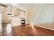 Bright living room featuring hardwood floors and a fireplace at 20229 E Red Fox Ln, Centennial, CO 80015