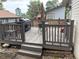 Relax on this outdoor deck with a grill, table and privacy fence at 14963 E Adriatic Pl, Aurora, CO 80014