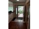 Bright entryway featuring tile flooring and a secure front door for welcoming guests at 14963 E Adriatic Pl, Aurora, CO 80014