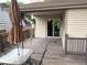 Cozy back patio with outdoor seating and hanging plants at 14963 E Adriatic Pl, Aurora, CO 80014
