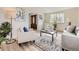 Cozy living room showcases neutral tones, stylish decor, and an inviting atmosphere at 6768 Vivian St, Arvada, CO 80004