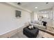 Cozy living room with light gray sofa, modern decor, and an inviting atmosphere at 6768 Vivian St, Arvada, CO 80004