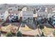 Aerial view of a home with a spacious backyard, deck, patio, and well-manicured landscaping in a suburban neighborhood at 7686 Grady Cir, Castle Rock, CO 80108