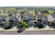 Suburban home showcasing neighborhood with tree-lined streets and beautiful landscaping at 7686 Grady Cir, Castle Rock, CO 80108