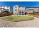 Well-kept backyard with a manicured lawn and stone landscaping at 7686 Grady Cir, Castle Rock, CO 80108