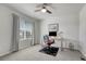 Comfortable bedroom space set up as an office with ample natural light at 7686 Grady Cir, Castle Rock, CO 80108
