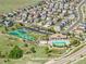 Aerial view of Cobblestone Ranch Clubhouse showing pool and tennis courts at 7686 Grady Cir, Castle Rock, CO 80108