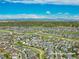 Aerial view of homes in neighborhood with community trails and mountain views at 7686 Grady Cir, Castle Rock, CO 80108
