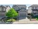 Charming two-story home with well-manicured lawn and a spacious two-car garage at 7686 Grady Cir, Castle Rock, CO 80108