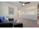 Hallway with an open-concept layout, showcasing a cozy seating area and neutral tones at 7686 Grady Cir, Castle Rock, CO 80108