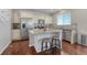 Modern kitchen featuring stainless steel appliances, granite countertops, and center island at 7686 Grady Cir, Castle Rock, CO 80108