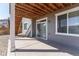 Cozy covered patio with backyard views, and easy access to the home at 7686 Grady Cir, Castle Rock, CO 80108