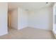 Carpeted bedroom featuring a partially obstructed window and neutral color palette at 20578 E 63Rd Ave, Aurora, CO 80019