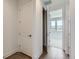 Hallway with wood floors leads to another room at 20578 E 63Rd Ave, Aurora, CO 80019