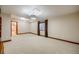 Spacious basement with neutral carpeting, recessed lighting, and classic wood trim at 7067 Gray Fox Ct, Highlands Ranch, CO 80130