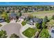 Aerial view of a gray two-story home with landscaped yard on a quiet cul-de-sac at 7067 Gray Fox Ct, Highlands Ranch, CO 80130