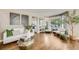 Bright living room with hardwood floors, contemporary decor, and an inviting atmosphere at 7067 Gray Fox Ct, Highlands Ranch, CO 80130