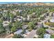 Lush neighborhood with mature trees and well-maintained homes, offering a serene and established community atmosphere at 13610 W Dakota Pl, Lakewood, CO 80228