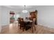 Inviting dining room with stylish furniture, warm lighting and a view of the sunroom at 13610 W Dakota Pl, Lakewood, CO 80228