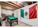 Basement featuring a pool table and a Mexican flag on the wall at 1621 S Idalia Cir # D, Aurora, CO 80017