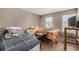 Bedroom with a bed and a nearby window at 1621 S Idalia Cir # D, Aurora, CO 80017