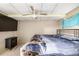 Finished basement bedroom featuring carpet and a ceiling fan at 1621 S Idalia Cir # D, Aurora, CO 80017