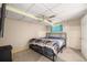 Finished basement bedroom featuring carpet and a ceiling fan at 1621 S Idalia Cir # D, Aurora, CO 80017