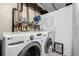 Basement laundry room with a full-sized washer and dryer at 1621 S Idalia Cir # D, Aurora, CO 80017