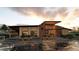 Exterior view of the community clubhouse, with modern design and landscaping at 17105 W 92Nd Loop, Arvada, CO 80007