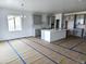 Spacious kitchen featuring gray cabinets, a center island, and modern finishes, ready for customization and move-in at 17105 W 92Nd Loop, Arvada, CO 80007
