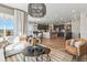 Open concept living space: living room, dining room, and kitchen at 17105 W 92Nd Loop, Arvada, CO 80007