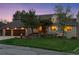 Charming home featuring a well-manicured lawn, mature trees, and a brick exterior at 6128 Songbird Cir, Boulder, CO 80303