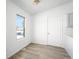 Bright dining room features a large window for natural light and views of the street at 5112 Duluth Ct, Denver, CO 80239