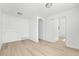 This living room features neutral walls and wood-look floors at 5112 Duluth Ct, Denver, CO 80239